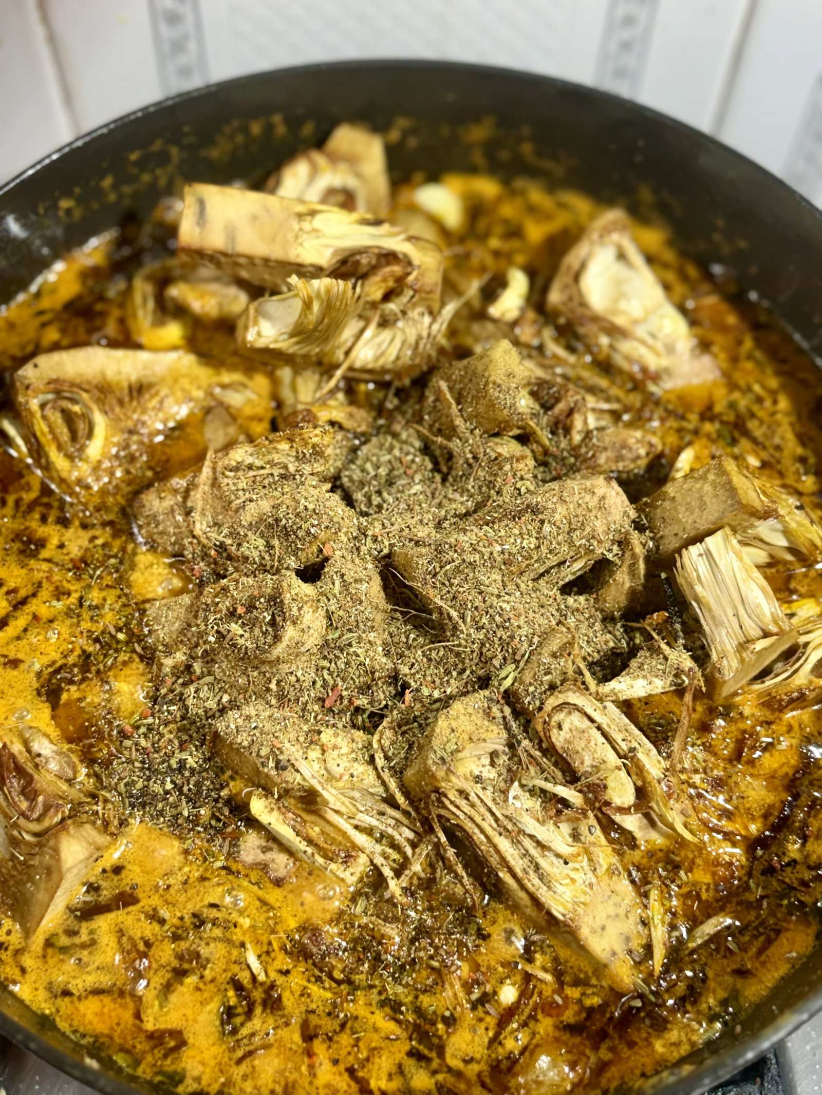 Step 5.1: Add fried jackfruit pieces and about 2 tbsp of prepared spice mix powder