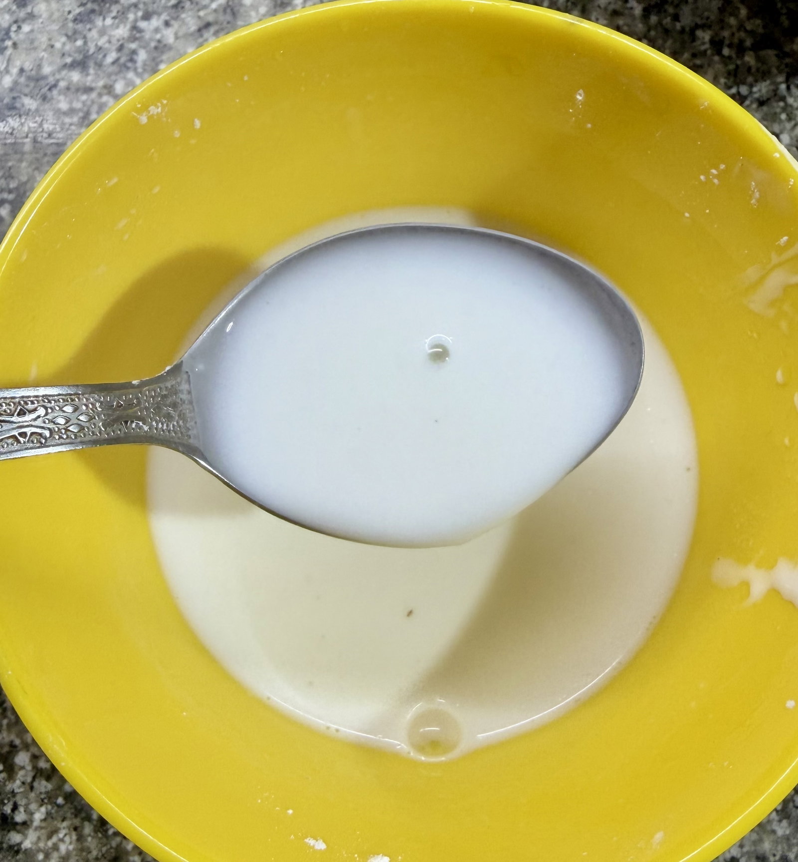 Step 1.1: Mix cornflour with water to make a smooth batter to coat the chicken pieces