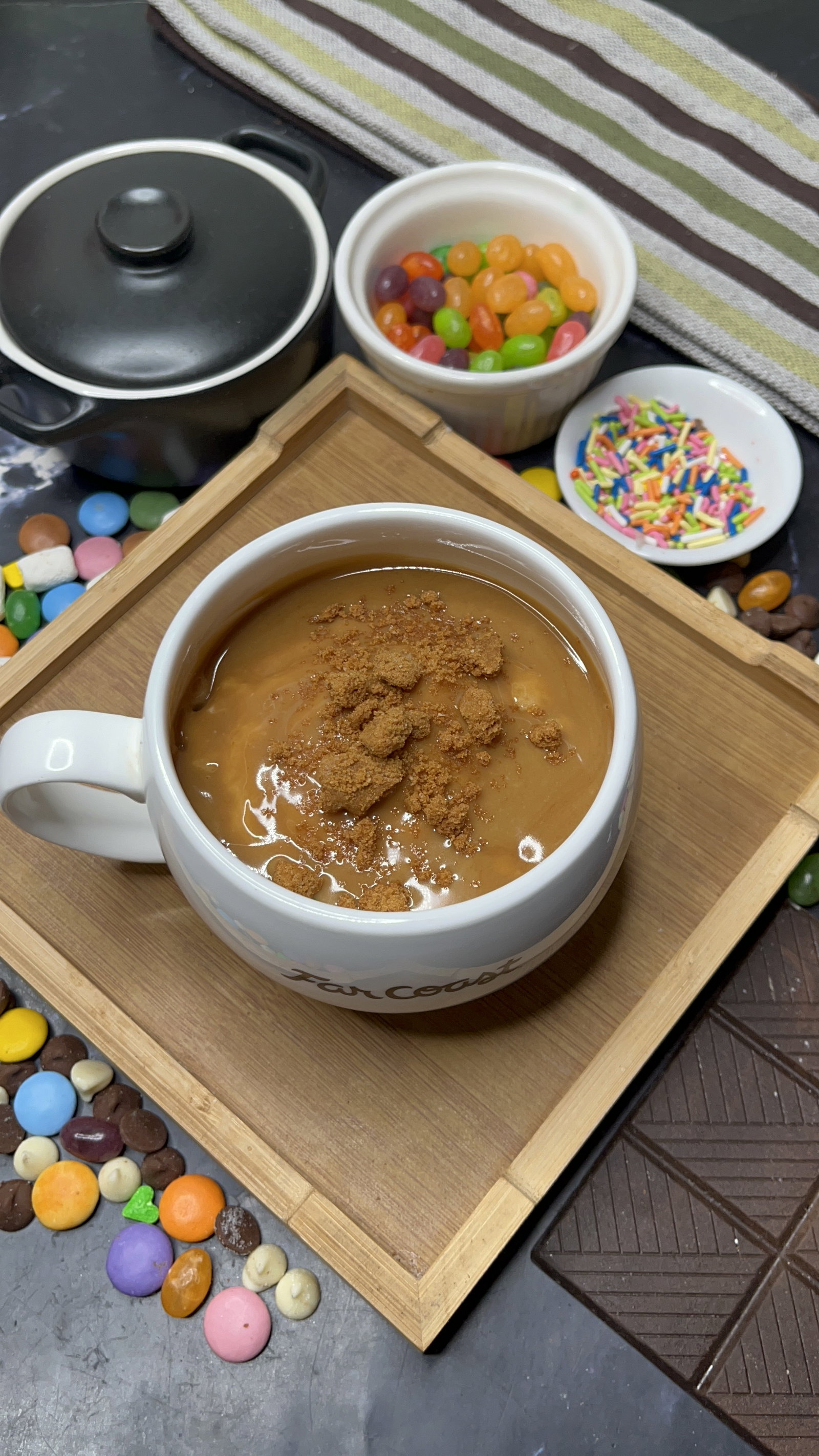 Step 6.1: Drizzle the Biscoff cream over the warm cake and spread it gently across the top
