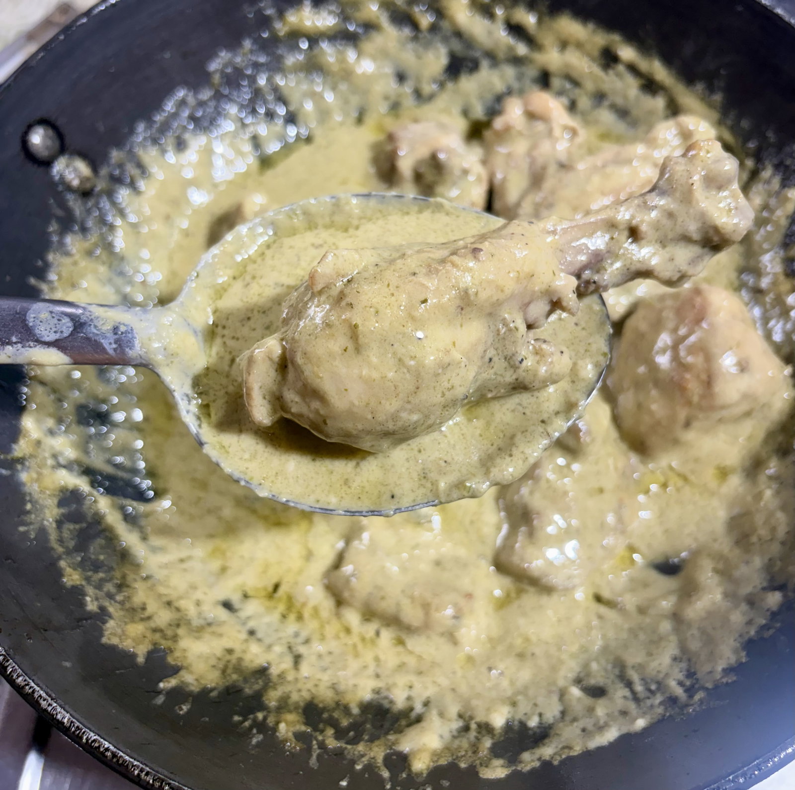 Step 4.2: Cover and simmer over low heat for 15–20 minutes, stirring occasionally, until the chicken is tender and the gravy is thick and coats the pieces