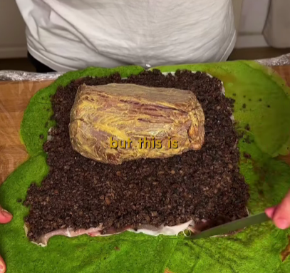 Step 4.1: Place the chilled beef in the center, trim any excess crêpe, and use the clingfilm to roll everything tightly into a log
