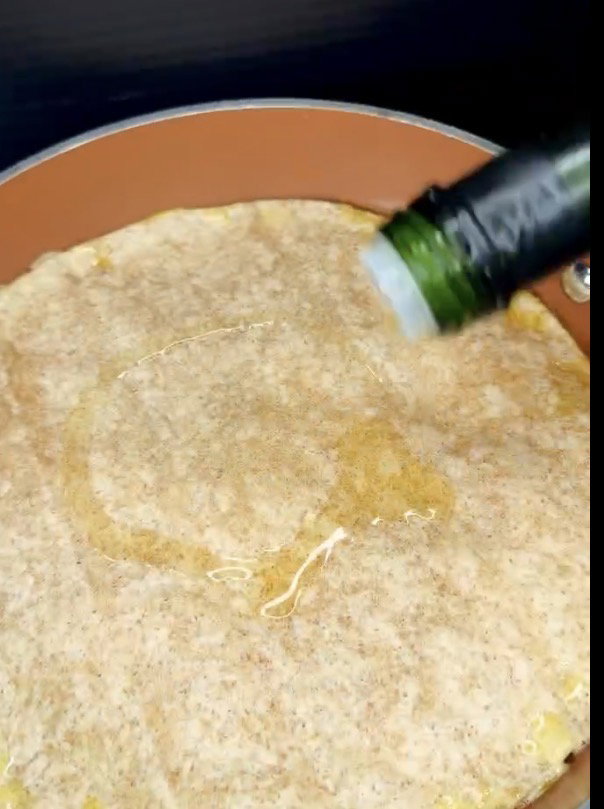 Step 1.1: Brush the top of the tortilla with remaining olive oil