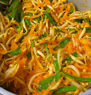 Step 1.1: Add the carrots, bean sprouts, chives, and cabbage (optional)