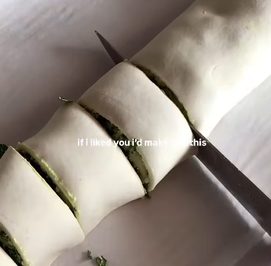 Step 1.1: Slice the log into rolls and place them on a lined baking tray