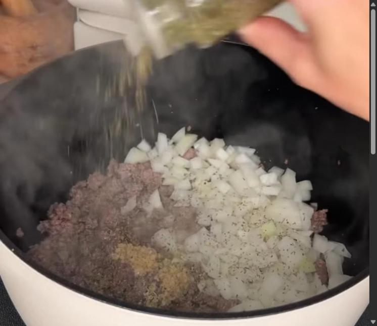 Step 1.1: Add onion, garlic, and seasonings to the pot, and sauté until onions have softened