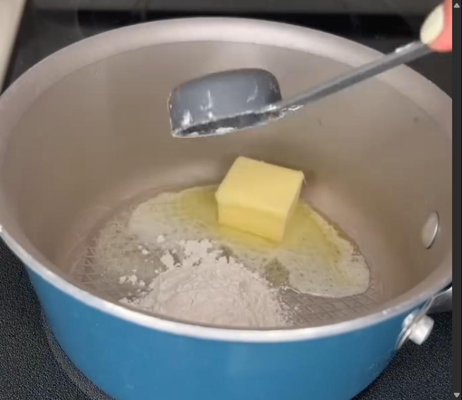 Step 3.1: Mix in 2 tablespoons of flour and whisk until combined