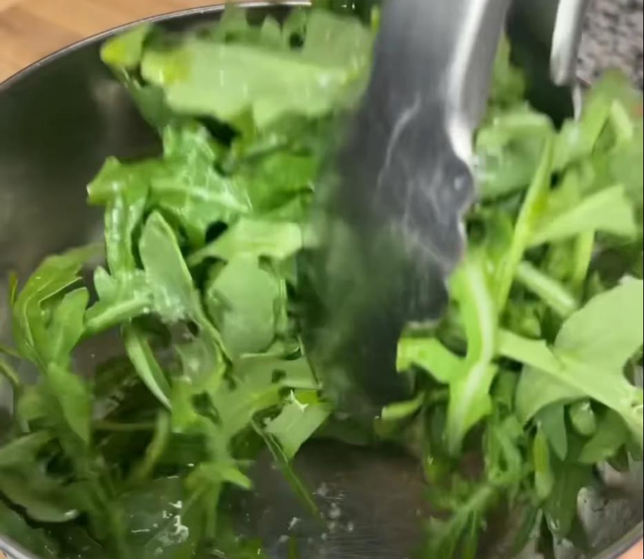 Step 3.1: In a small bowl, toss arugula with olive oil and salt