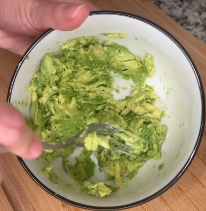 Step 3.1: Mash avocado and spread onto white corn tortillas