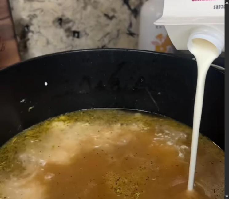 Step 1.1: Pour in chicken broth and heavy cream and bring to a boil