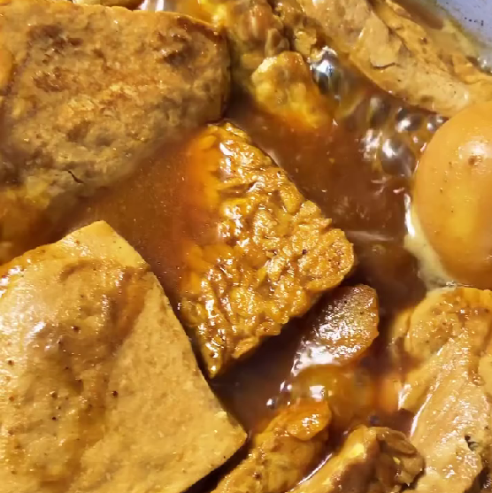 Step 5.2: Add the tempeh, tofu, and boiled eggs to the pot