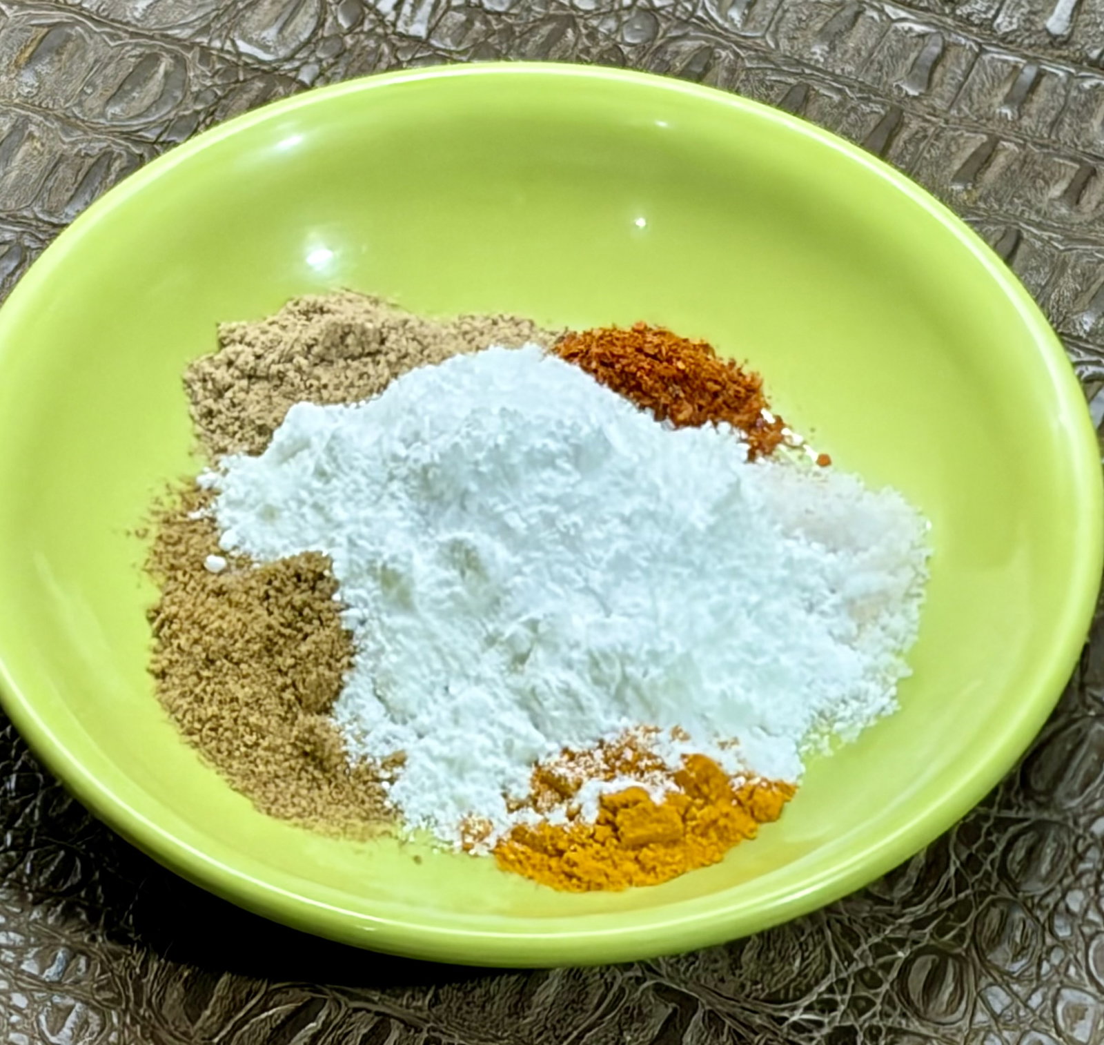 Step 1.1: Combine turmeric powder, red chilli powder, amchur powder, chaat masala, powdered sugar, and salt in a small bowl