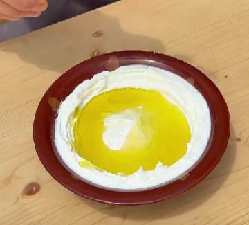 Step 4.1: Transfer the labneh to a serving dish and drizzle with plenty of olive oil