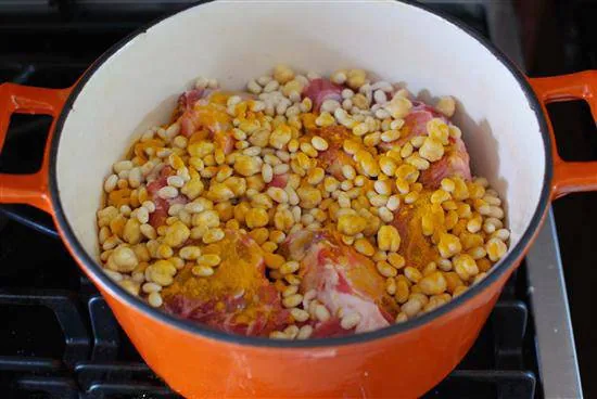 Step 1.1: Place the lamb and lamb tail fat in a large pot with enough water to cover