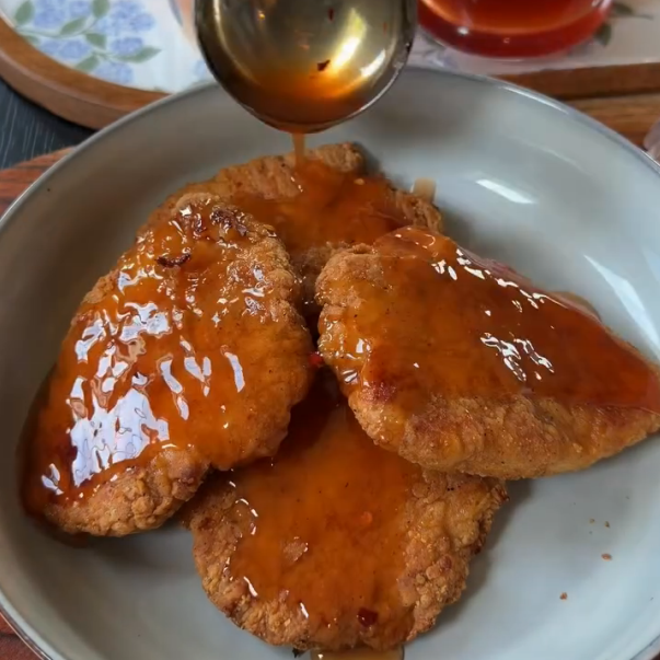 Step 1.1: Toss or brush the hot chicken generously with hot honey