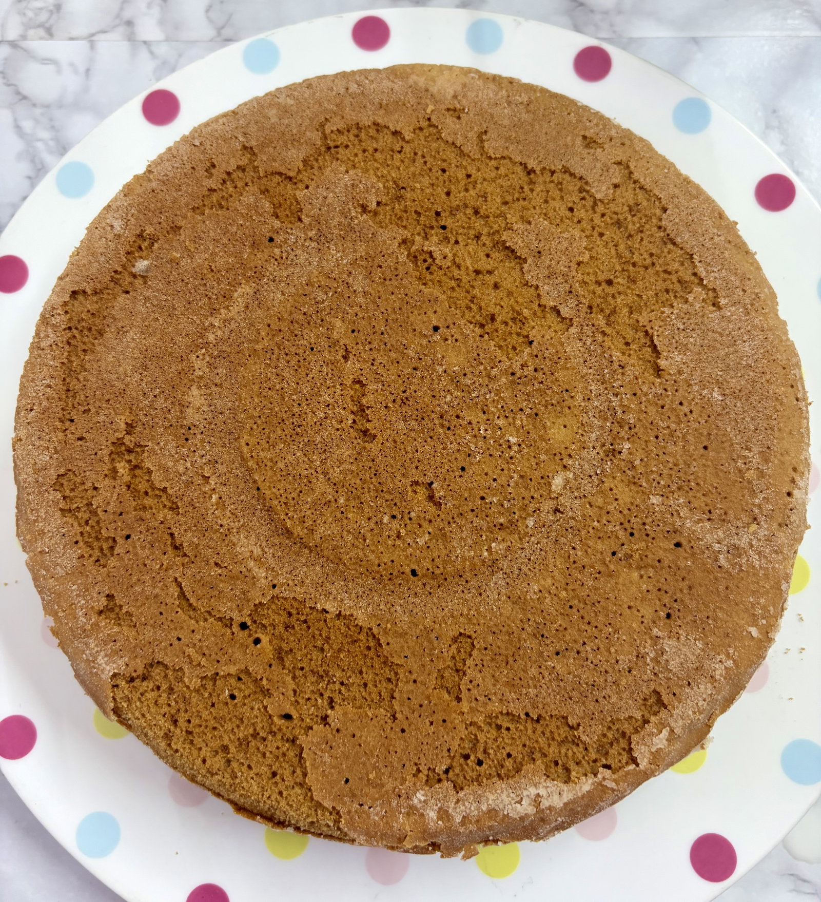 Step 4.3: Remove the tin, run a knife or a toothpick around the edges, and invert the cake onto a rack to cool completely