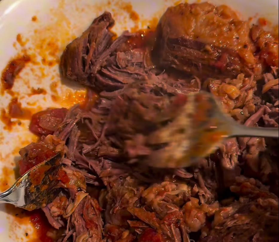 Step 1.1: Remove beef from the pot, shred it, and add back into the sauce