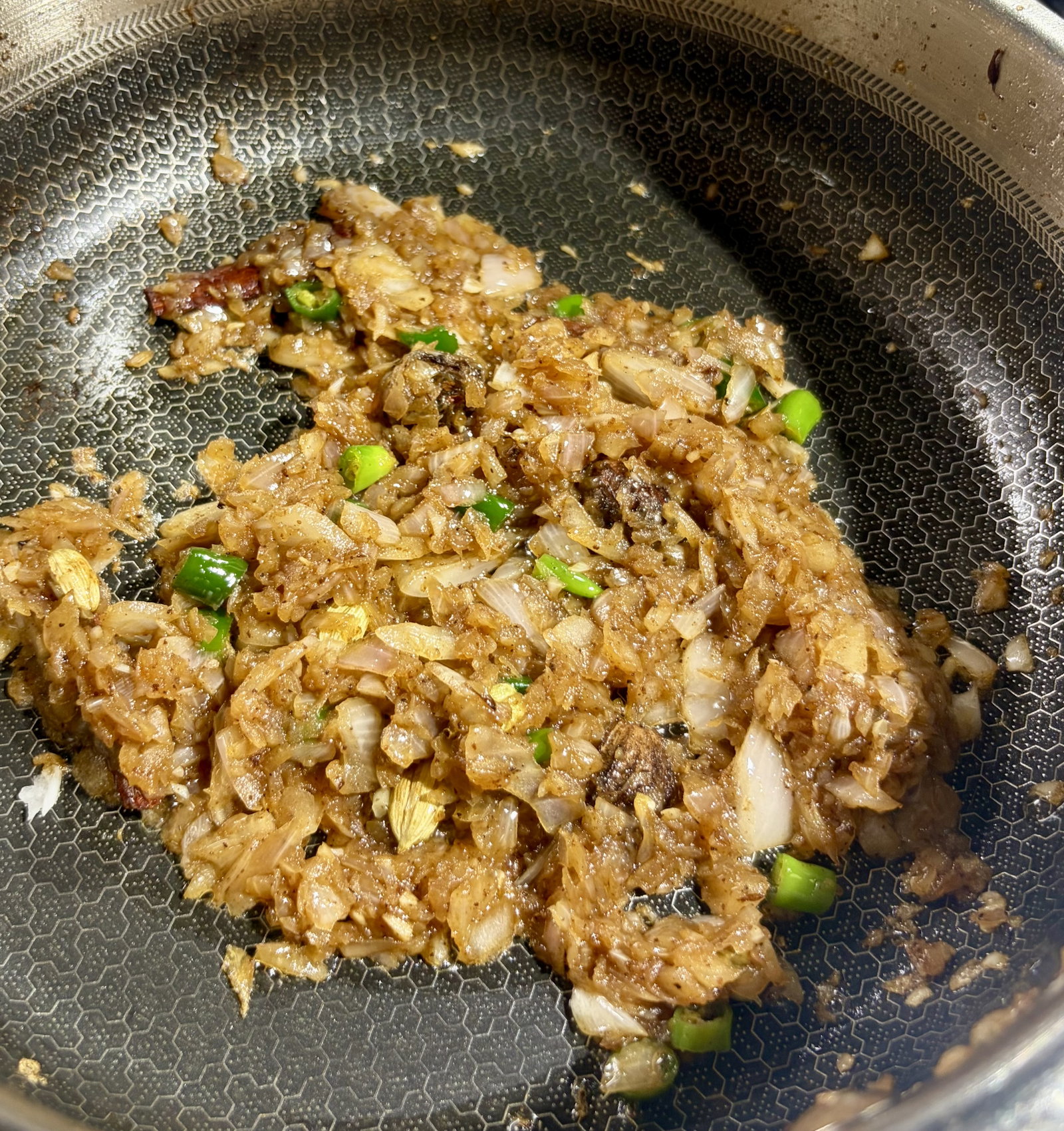 Step 4.2: Add the chopped onions and green chillies