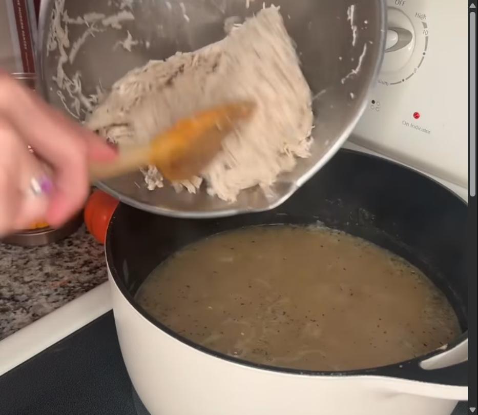 Step 1.1: Remove chicken breasts from the pot and shred them using two forks