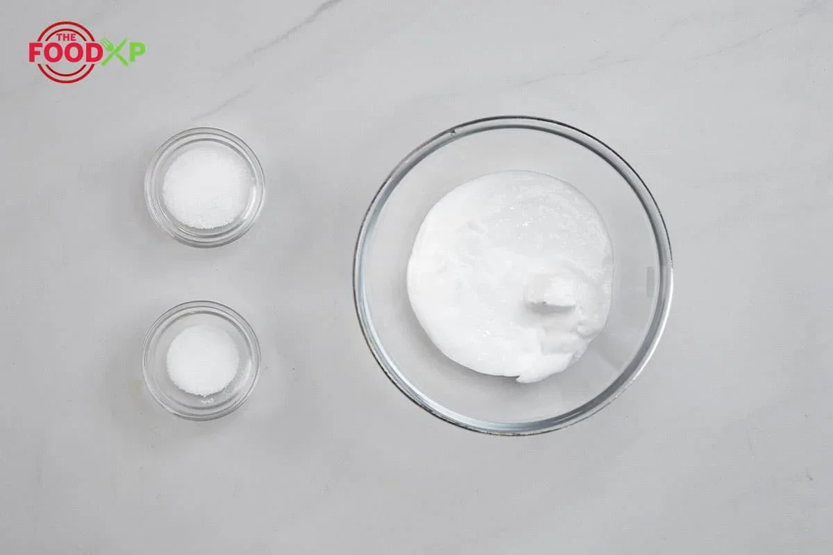 Step 1.1: Meanwhile, add 2 cups of chilled heavy cream, 3 teaspoons of sugar, and ¼ tsp kosher salt to the bowl