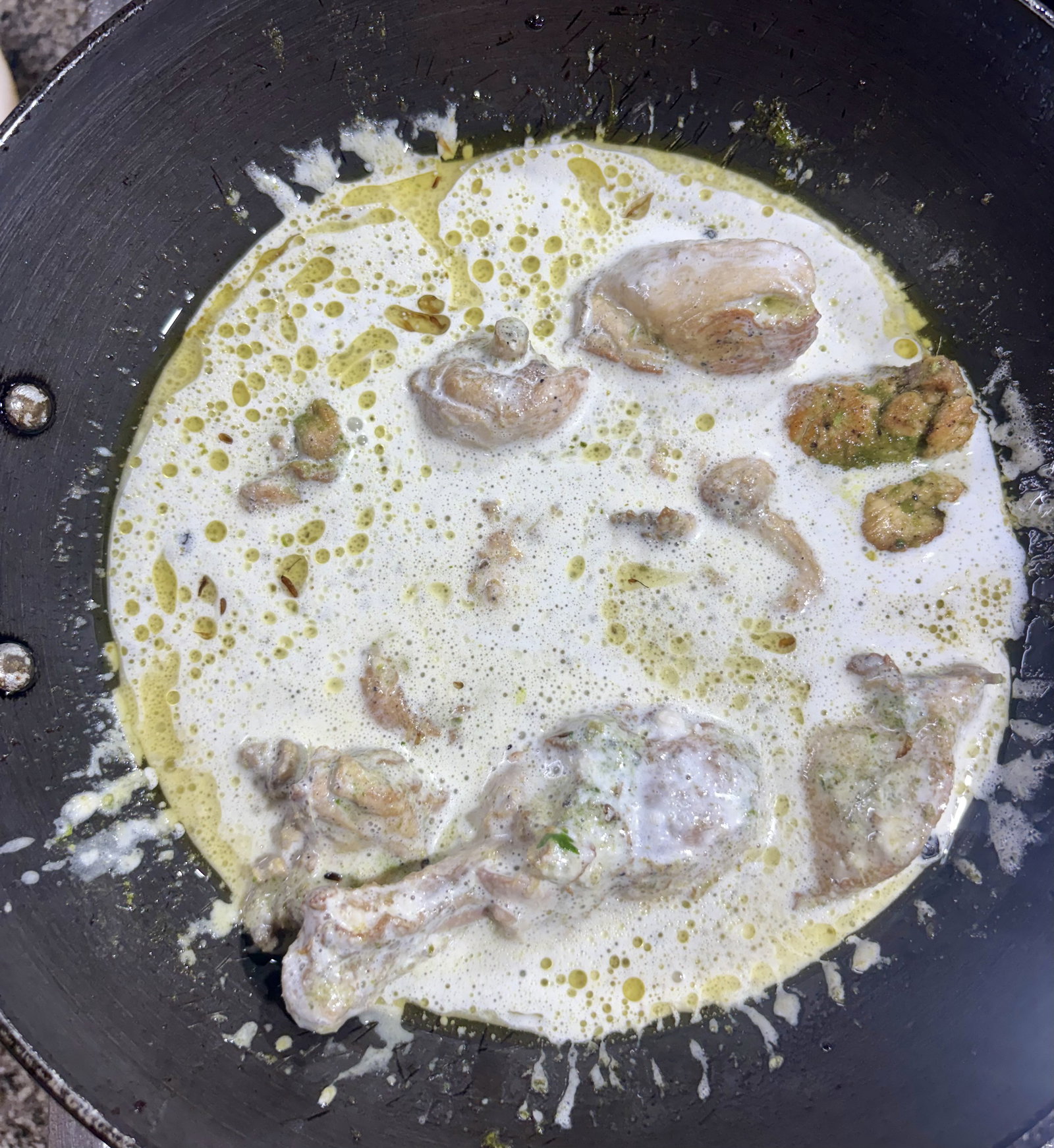 Step 4.1: Lower the heat, then add the cashew-cream paste and the cornflour slurry, stirring continuously for a few seconds