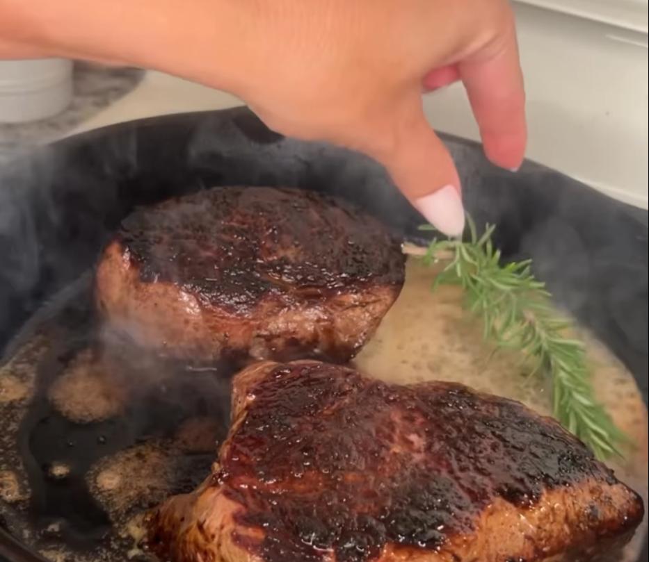 Step 1.1: While steaks finish cooking, add butter and rosemary to the pan, and spoon melted butter over top of steaks