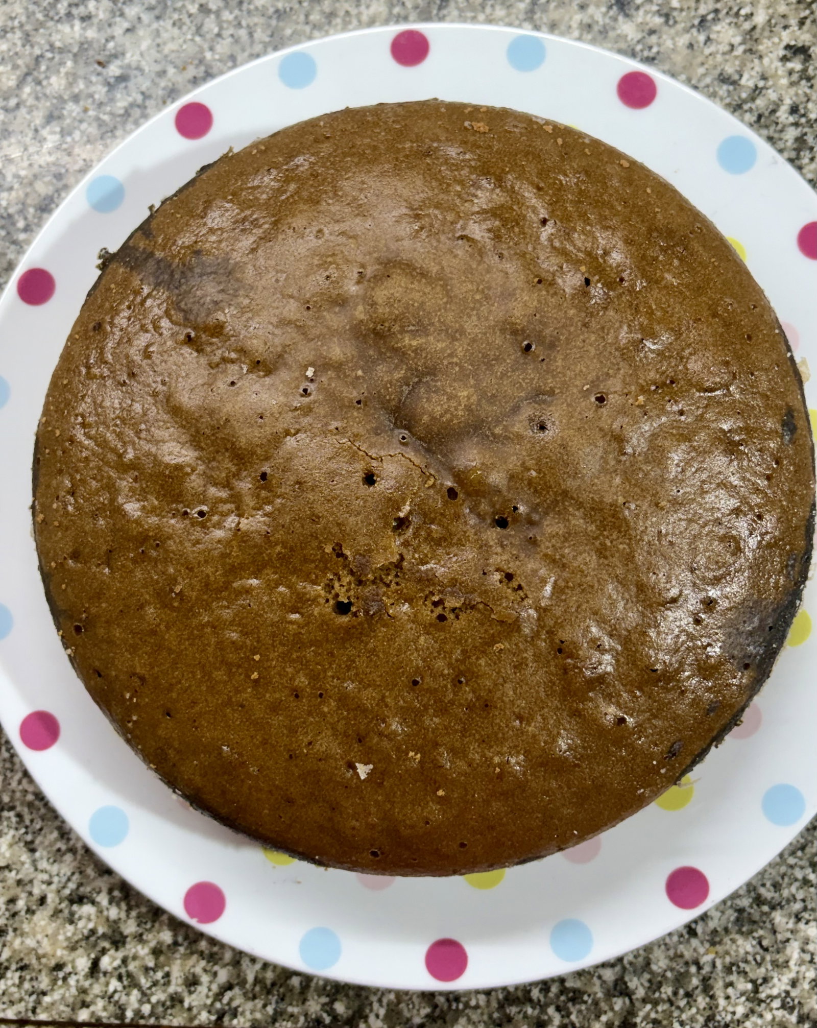 Step 4.2: Remove the tin, run a knife or a toothpick around the edges, and invert the cake onto a rack to cool completely