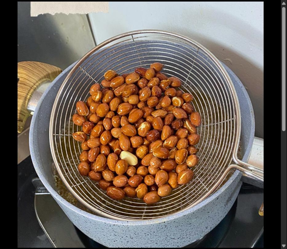 Step 2.1: Fry the peanuts in oil until golden brown