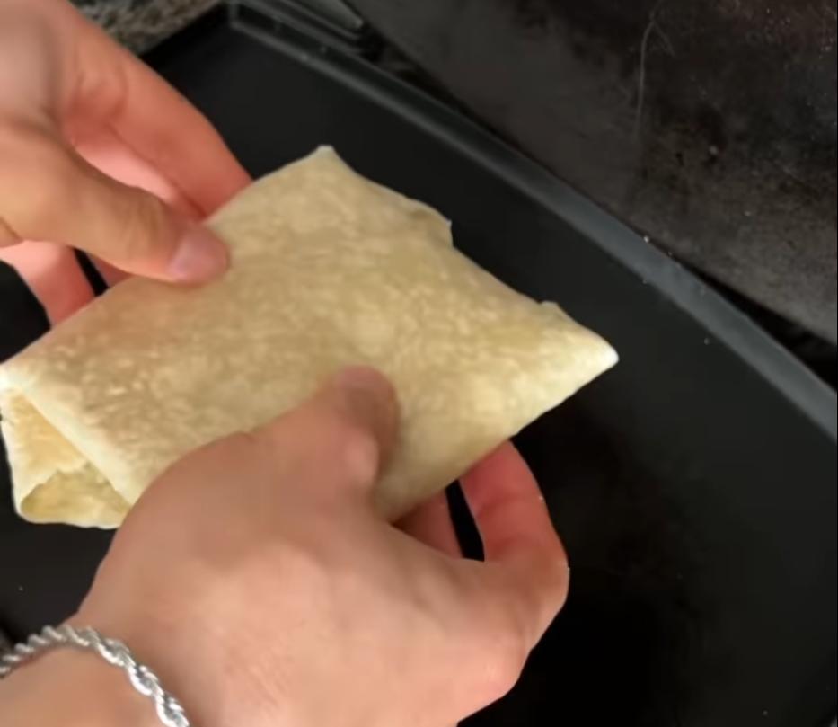 Step 1.1: Fold all the edges of the wrap into the middle
