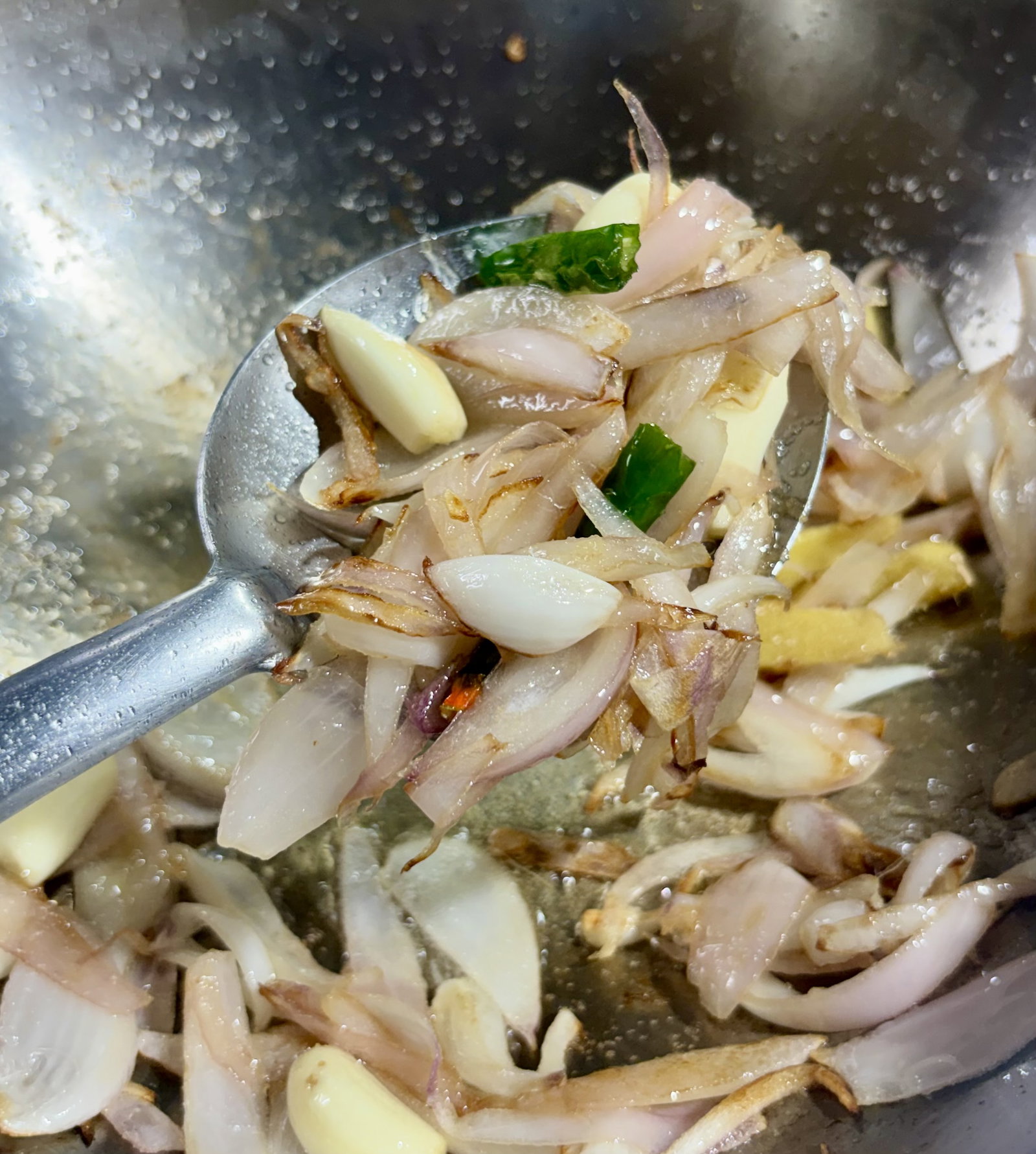 Step 2.2: Add the ginger, garlic, green chillies, and salt