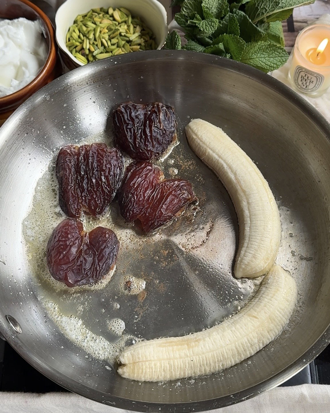 Step 1.2: Add sliced ripe bananas and Medjool dates to the pan
