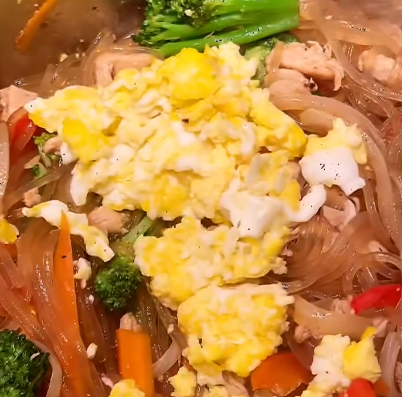 Step 1.1: Add scrambled eggs and gently stir to combine