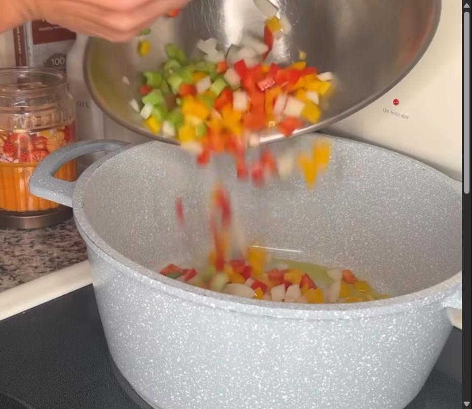 Step 1.1: Heat olive oil in a large pot and sauté onion, bell peppers, and celery stalks until softened and aromatic