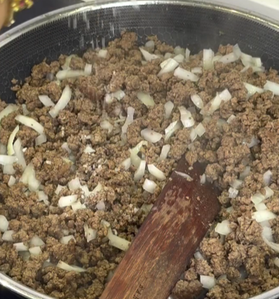 Step 1.1: Once the beef releases its fat, carefully drain off the excess oil to achieve a crispy texture