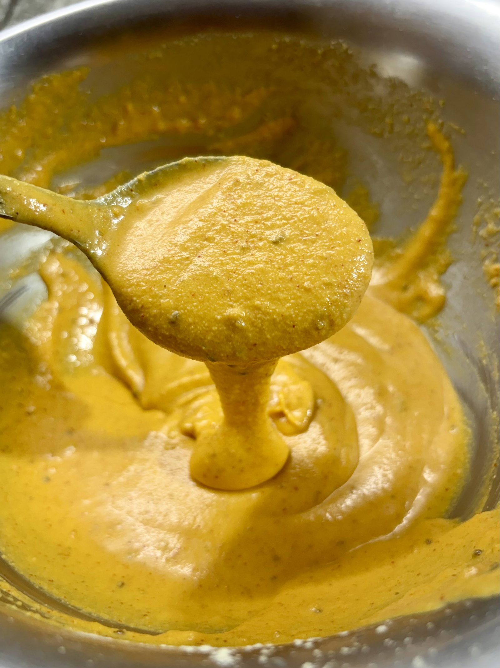 Step 3.1: Whisk vigorously for 4–5 minutes to aerate the batter for light dumplings, then rest for 5–10 minutes to let the besan hydrate
