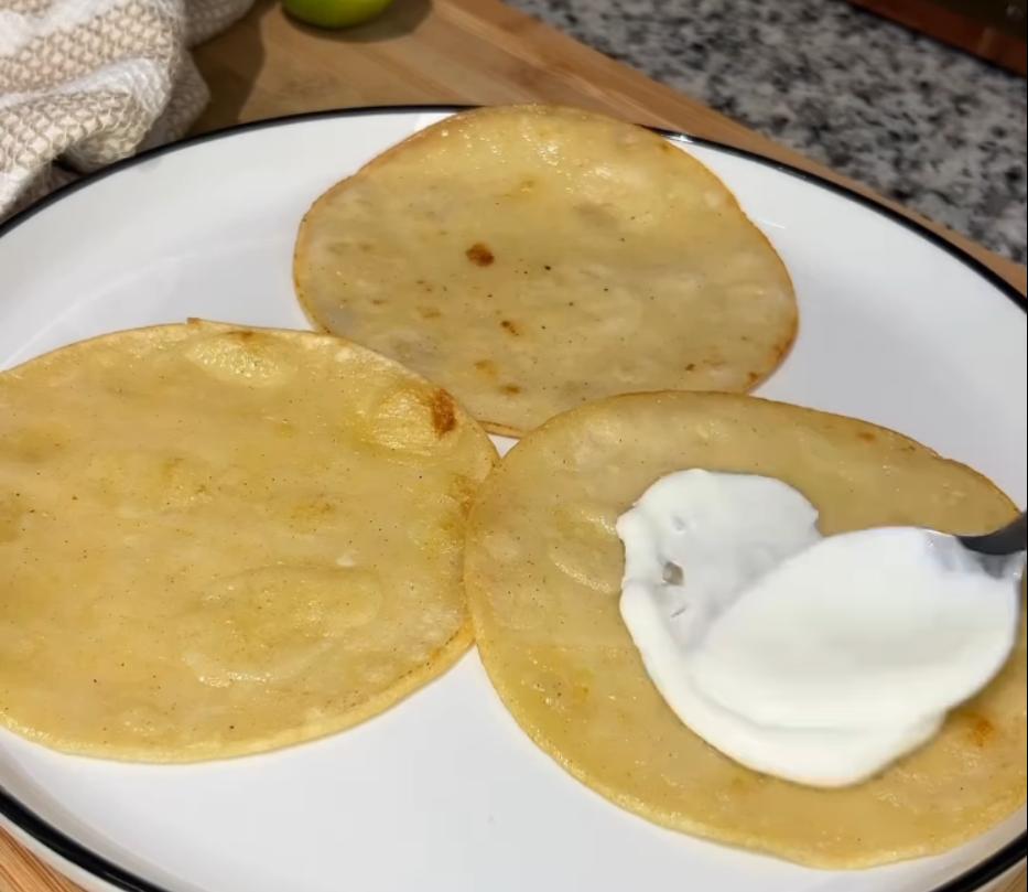 Step 4.1: Heat white corn tortillas on a grill or pan until warm and slightly charred
