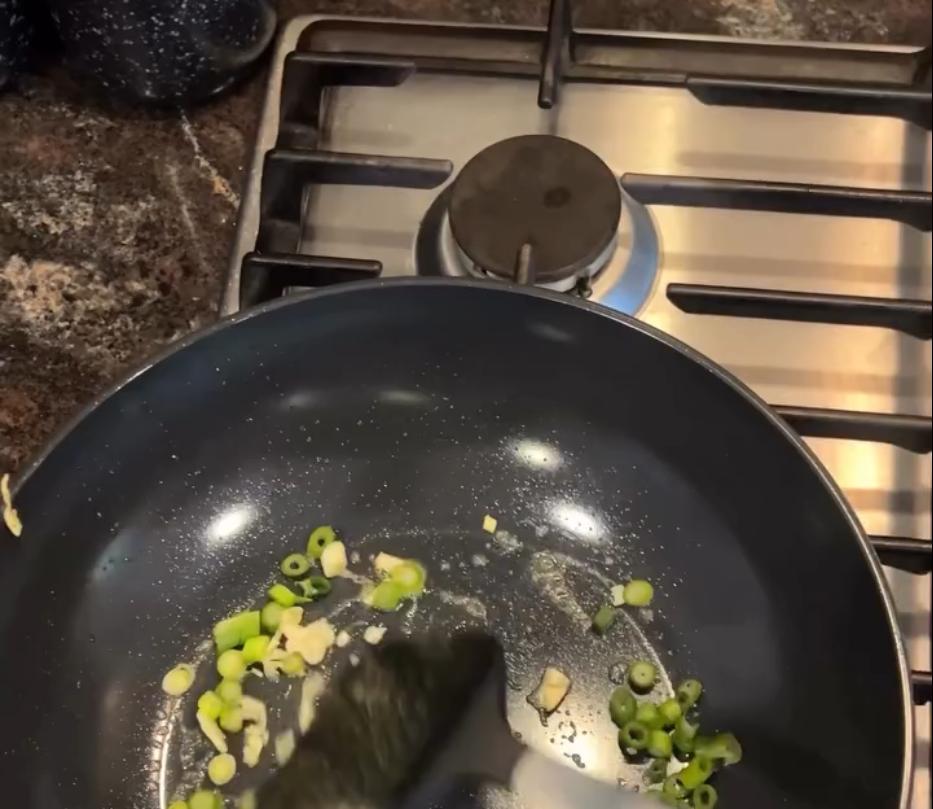 Step 1.1: Cook the garlic and the white parts of the spring onion in the butter until fragrant