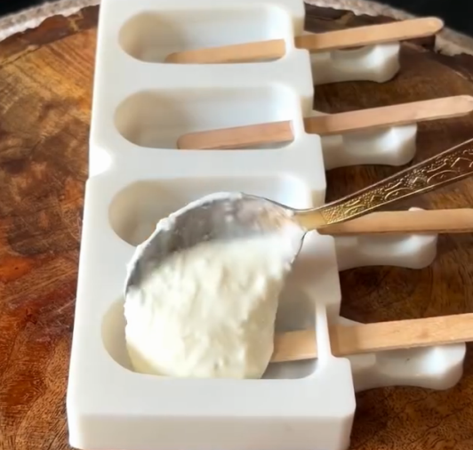 Step 1.1: Pour the mixture into popsicle molds