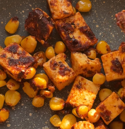 Step 3.1: Season the mixture with peri peri seasoning, oregano, and chilli flakes