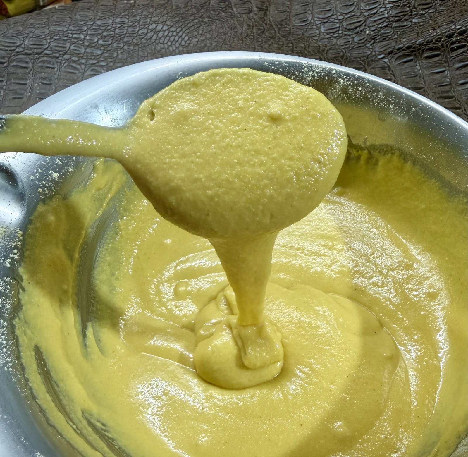 Step 1.1: Add sifted besan to a large bowl
