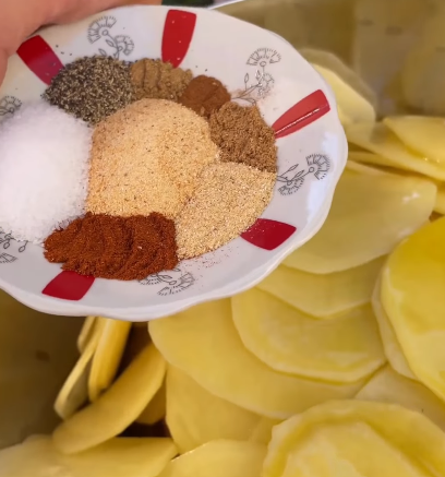 Step 2.1: Mix chicken and potatoes together with the spices