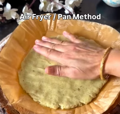 Step 1.1: Shape the mixture into a medium-thick round base