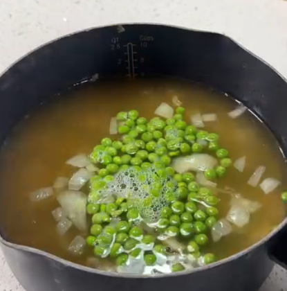 Step 1.1: Add the vegetable stock, then stir in the split peas and potatoes