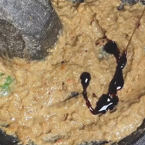 Step 1.1: Add kecap manis as the final touch and mix well