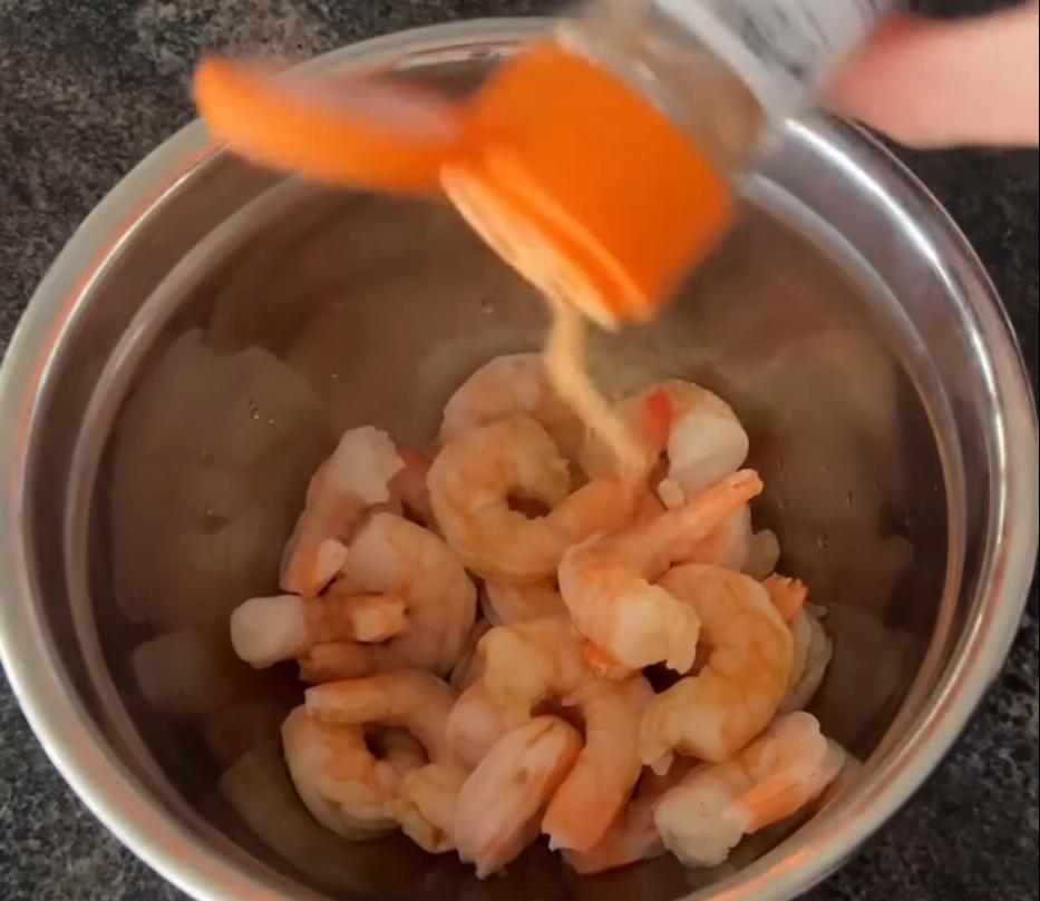 Step 3.1: Toss the cooked prawns through the sauce