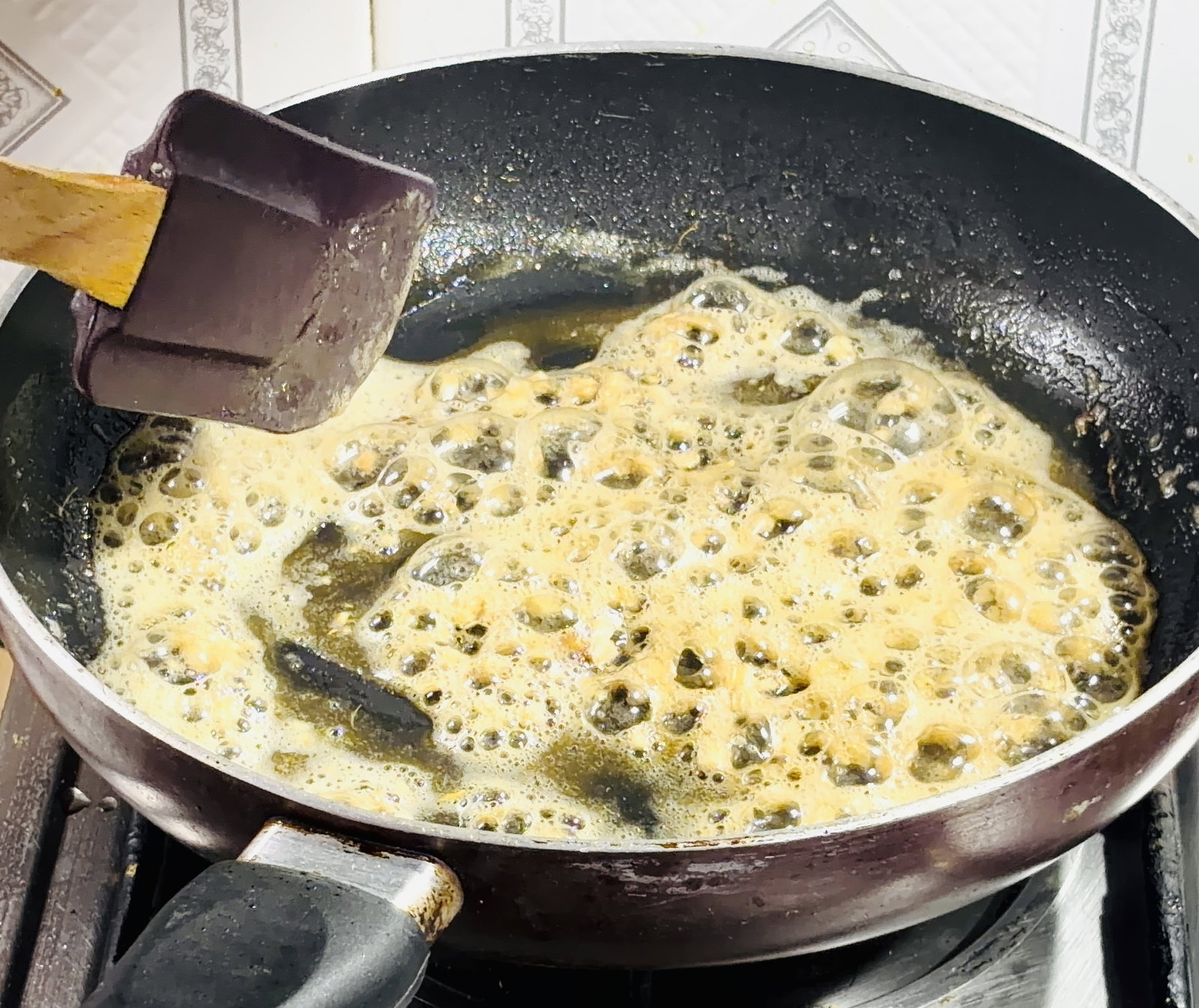 Step 3.1: Add all-purpose flour and water, stirring continuously to form a smooth sauce