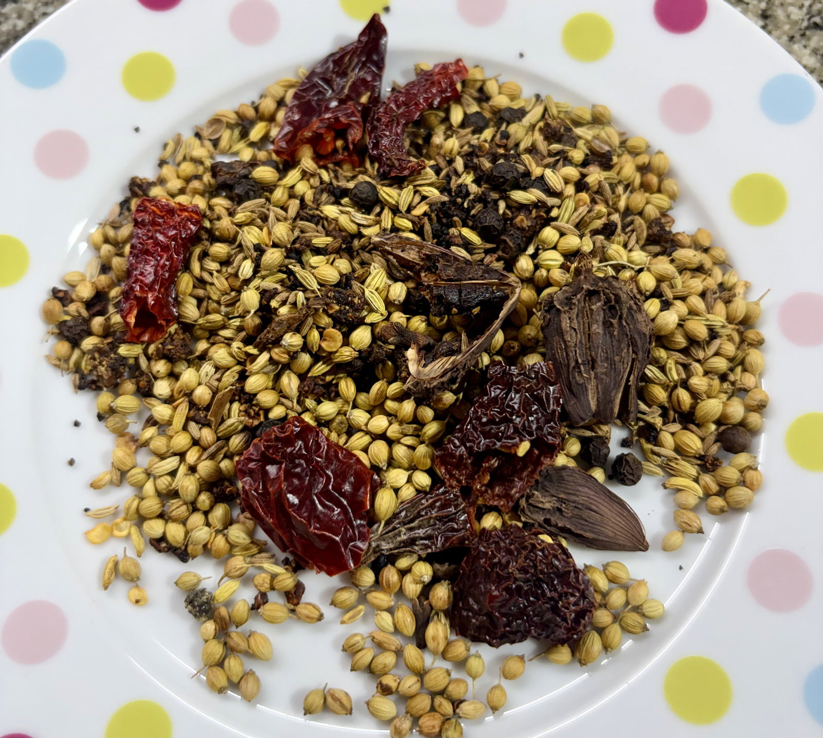 Step 1.1: Transfer the roasted spices to a plate and let them cool completely