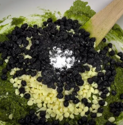 Step 1.1: Add the dried blueberries, mini white chocolate chips, and baking powder