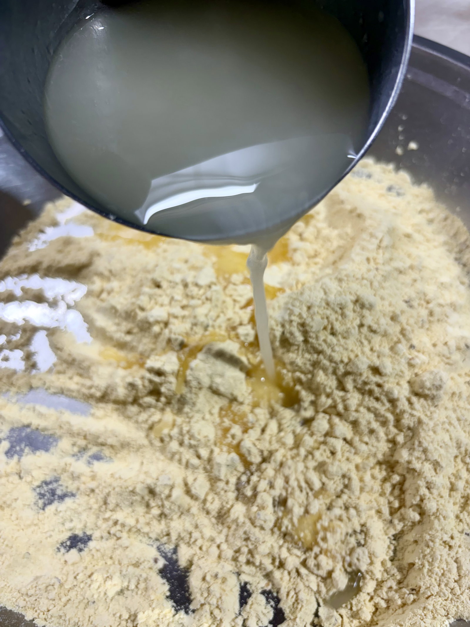 Step 2.1: Gradually pour in the emulsified oil-water mixture