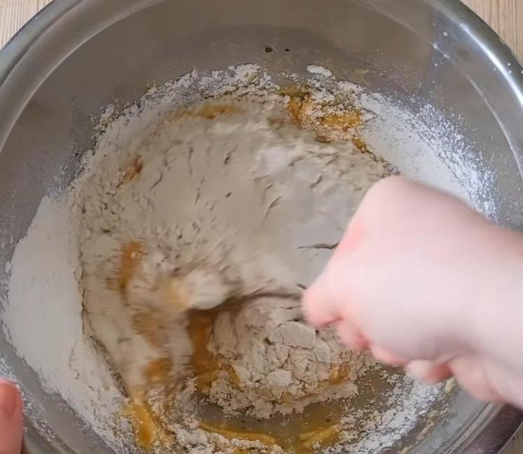 Step 1.1: Add plain flour and baking powder to the mixture and mix again