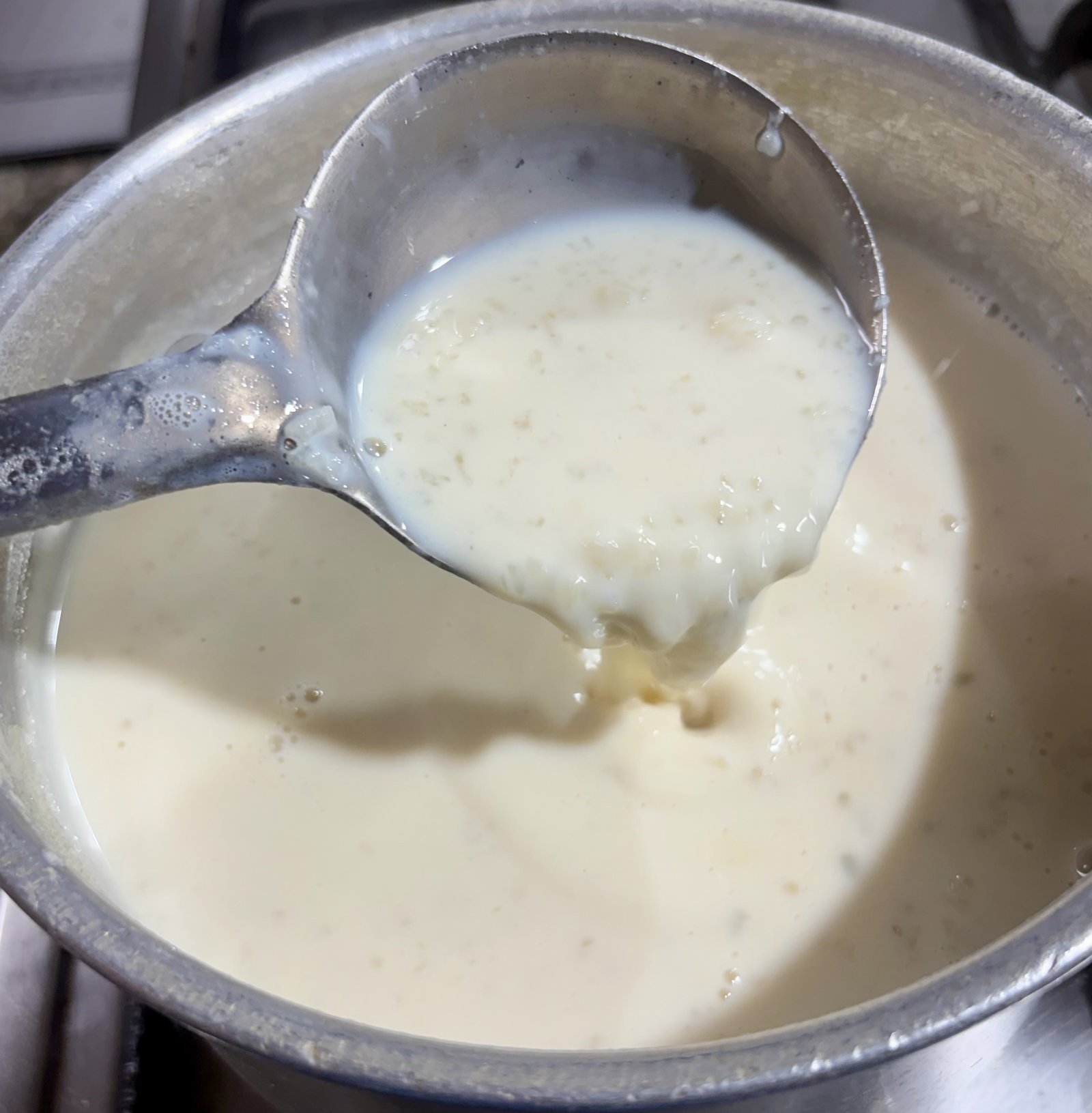 Step 2.2: Add the mashed rice to the pan and stir well to break up any lumps